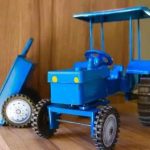 Beautiful_hard_plastic_Metalic_look_Tractor_Toy_25_image_1.jpg