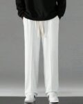 flocculent_white_men_baggy_fit_pleated_trousers.jpg